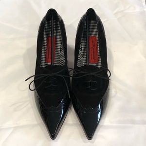 Powerful black patent leather heels